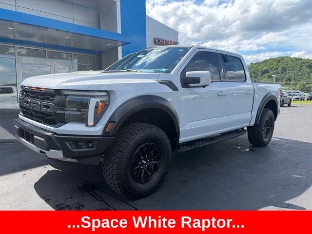 2025 Ford F-150 Raptor in Space White Metal — front three-quarter view