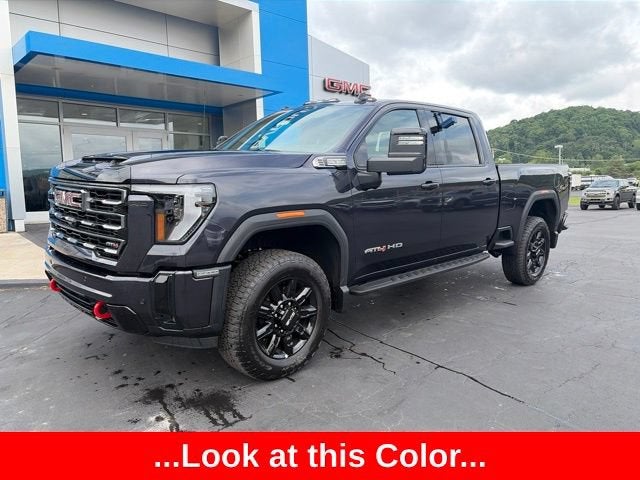 2026 GMC Sierra 2500 HD AT4 in Titanium Rush Metallic — front three-quarter view