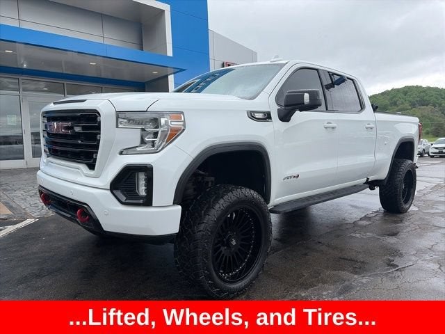 2021 GMC Sierra 1500 AT4 in Summit White — front three-quarter view
