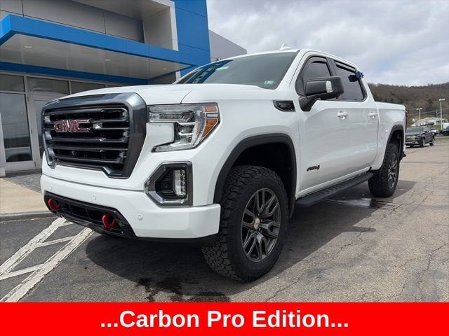 2021 GMC Sierra 1500 AT4 in Summit White — front three-quarter view