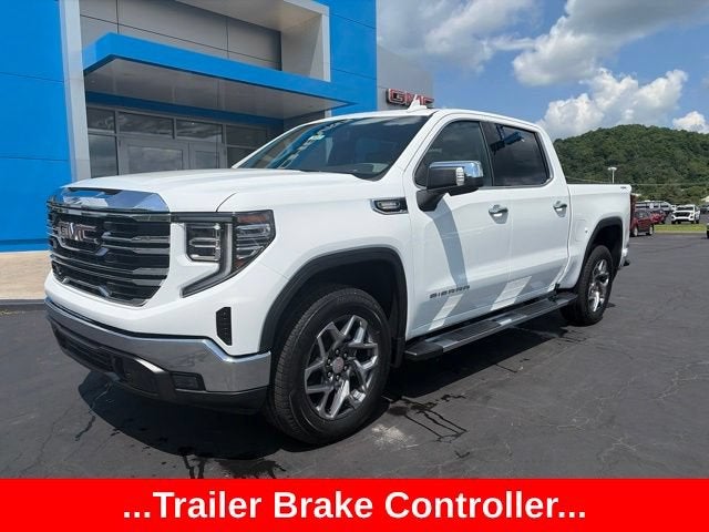 2026 GMC Sierra 1500 SLT in Summit White — front three-quarter view